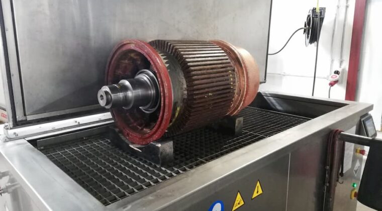 Ultrasonic cleaning of electric motor